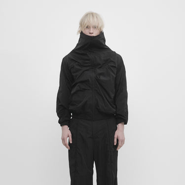 VESTE TRACK AVEC MOUVEMENT FIGÉ